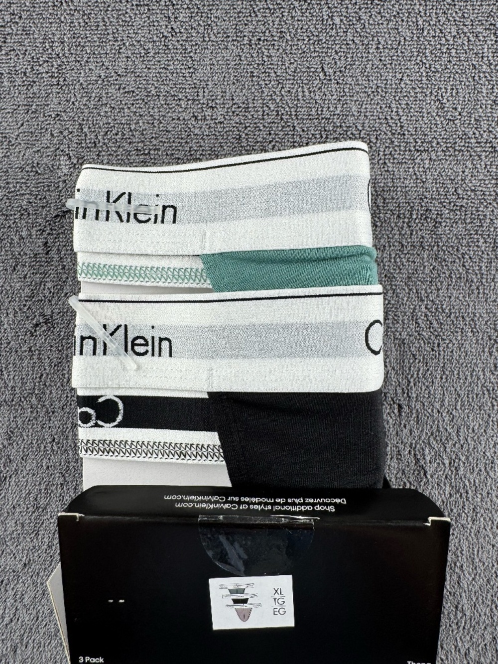 Two pairs men's Calvin Klein modern cotton stretch thongs